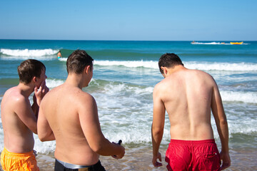 Fototapeta premium Summer and vacation. Close friends are relaxing at sea.