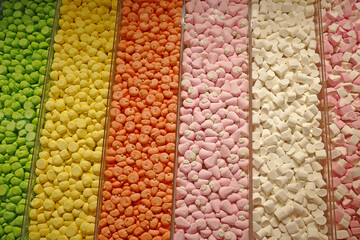 Sweets and candies shop, close-up colorful background