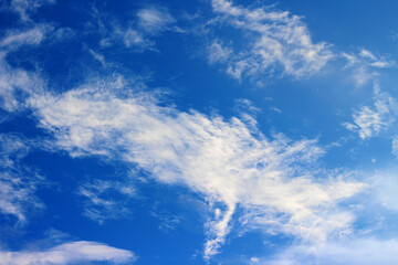 Blue sky with clouds. Beautiful Cirrus clouds on a blue sky. Daylight Natural sky composition Ideal.
