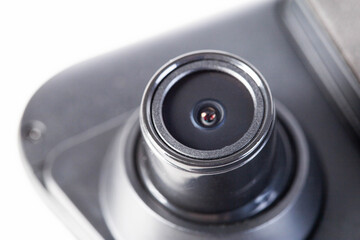 DVR camera eye on a white background, maximum video recording resolution and frame rate. Car mirror with video recorder.