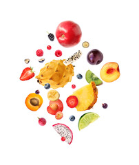 Creative layout made of blueberry, apricot, dragonfruit, kiwi, watermelon, pineapple, strawberry, grapes, lime and apple, banana on the white background. Flat lay. Food concept. Macro concept.