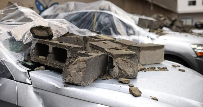 Surfaces of automobiles damaged due to falling stones