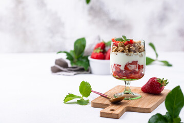 Dessert with strawberry, yogurt and granola