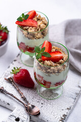 Dessert with strawberry, yogurt and granola
