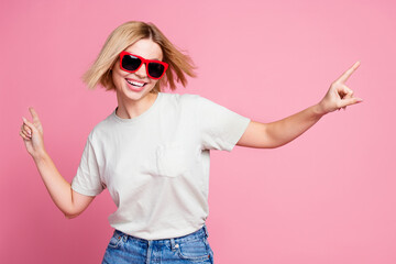 Photo of pretty nice adorable girl wear stylish grey clothes have fun weekend isolated on pink color background