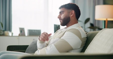 Thinking, relax and man on sofa for regret, decision or relationship mistake in living room. Thoughtful, home and Indian person for problem solving, reflection or remorse from communication issues