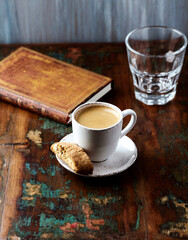 Cup of coffee and Cantuccini (Italian cookie) on dark wooden background. Copy space.	
