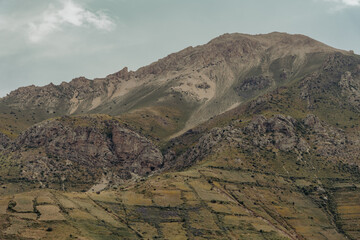 The mountain is covered in rocks and has a rocky, barren appearance