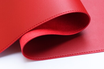 shiny red leather texture isolated on white background