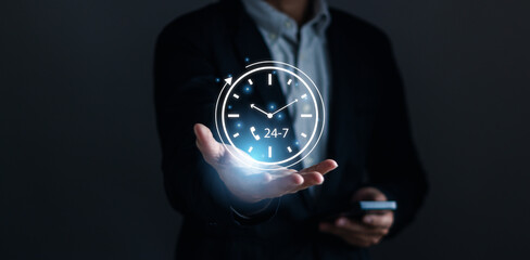 Concept of nonstop service or full time customer service ,Businessman's hand showing virtual 24-7...