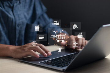Online shopping service, e-commerce technology,payment, online marketing concept .man use computer with shopping cart icon Online shopping on application or web pages Online marketing