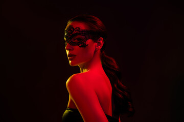 Photo of attractive lady nude shoulders lace mask enjoy halloween party isolated black orange neon...