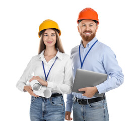 Engineers in hard hats with laptop and drafts on white background