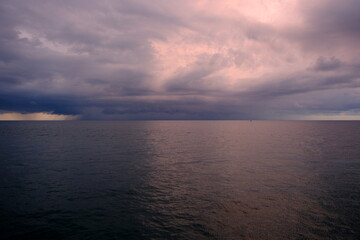 Dramatic stormy sky over the sea. Nature composition. Dramatic sky with storm clouds.