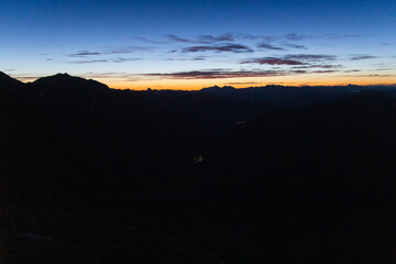 Mountain panorama and valley with village Pfelders during sunrise in Texel group, South Tyrol, Italy