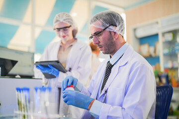 scientists and doctors clad in lab coats are rigorously testing chemicals, serums, and antibiotics...