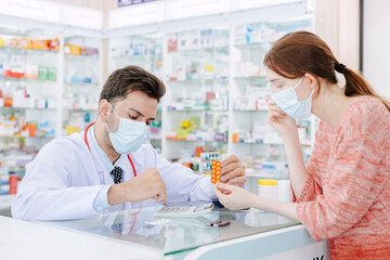 Pharmacy doctor selling medicine to sick women suggest health consult to select right good medicine...