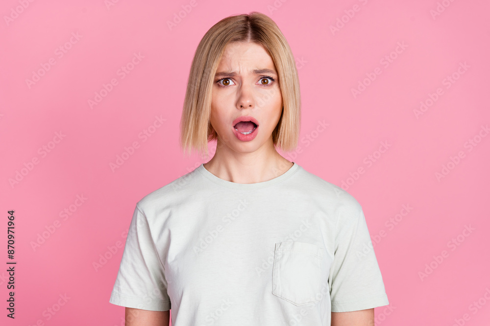 Poster Photo of pretty young woman open mouth stare wear t-shirt isolated on pink color background