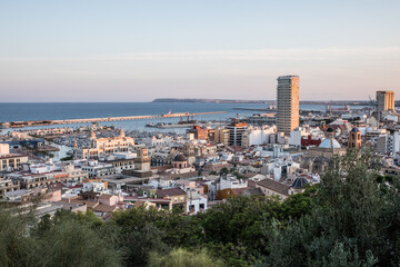 Aerial View of Alicante Cityscape With Harbor and Sunset