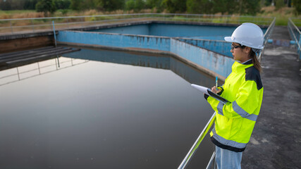 Environmental engineers work at wastewater treatment plants,Water supply engineering working at Water recycling plant for reuse