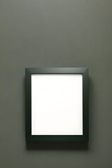 Mock-up of white frame on green wall
