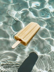 Beige Popsicle on a Pool Water Background. Summer Vacation Wallpaper