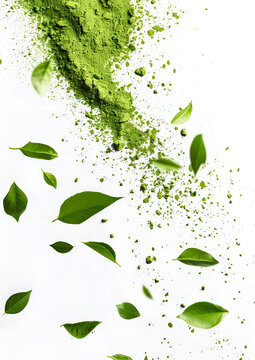 Green matcha powder and leaves falling on white background