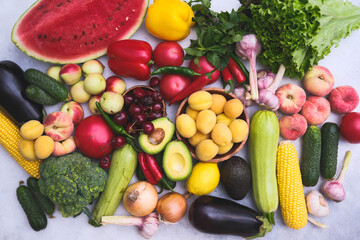 Fresh vegetables, fruits on gray background, flat lay