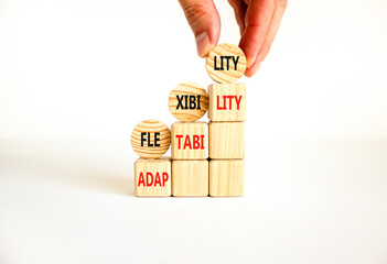 Flexibility or adaptability symbol. Concept word Flexibility Adaptability on beautiful wooden...
