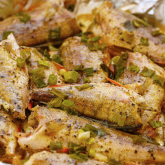 Fried or baked in foil river European perch