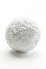 Fototapeta premium A close-up shot of a snowy ball on a white surface