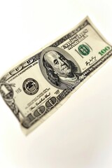 A single one dollar bill on a white background