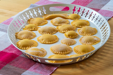 Hand made Ravioli noodles in close up view with soft bokeh background