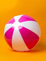 Obraz premium Magenta and White Beach Ball on an orange Background. Summer Wallpaper