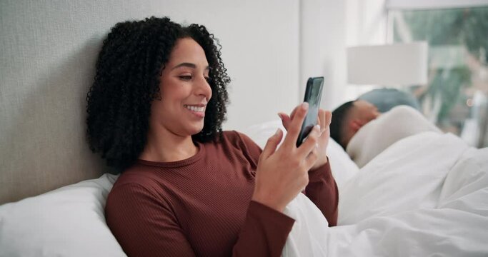 Morning, relax and woman in bed with mobile for social media, scroll internet or texting in bedroom. Online, smartphone and African person for communication, browsing web or posting meme in home