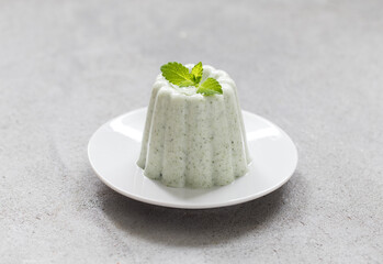 Mint Cream pudding. On a plate. Close-up