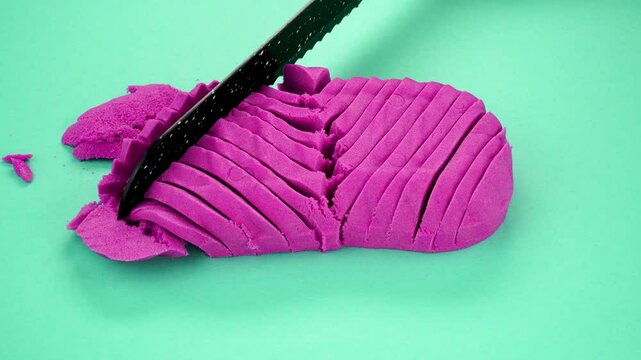Very Satisfying and Relaxing Kinetic Sand ASMR video. Cutting anti stress macro close up colorful Kinetic Sand with a Knife. ASMR sounds.