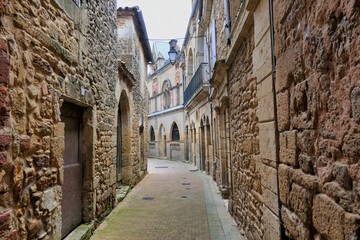 Medieval street in the 11th century fortified village of Belves in the Dordogne, France
