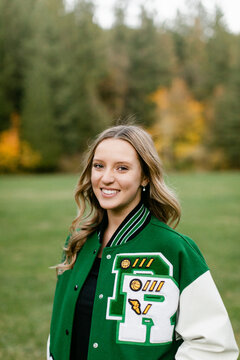 Portrait of High School Athlete in Varsity Jacket