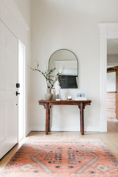 Modern, Traveled Entryway with Arch Mirror