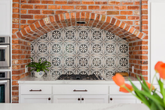 Rustic Brick Stove Surround with Vibrant Tile