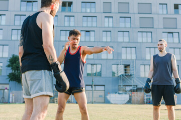 Muay Thai Training Outdoors - Instructor and Students