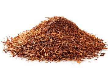 A pile of rooibos tea on a white background