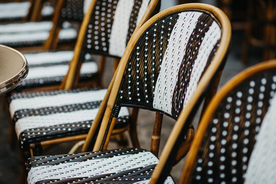 close up of bistro chairs in Paris