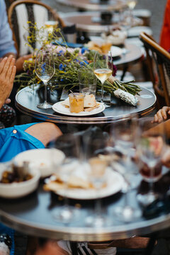 Enjoying food and drinks on a Parisian Bistro outdoors