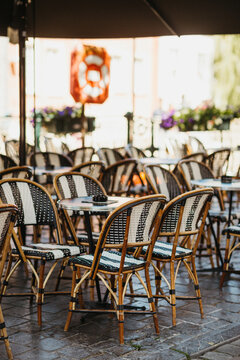row of bistro chairs in Paris
