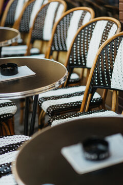 close up of bistro chairs in Paris