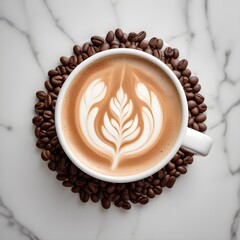 A white ceramic cup filled with a latte or cappuccino, surrounded by roasted coffee beans scattered on a light marble surface. The coffee drink has an intricate latte art design on the surface