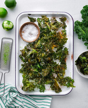 Baked kale chips with lime and salt.