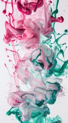 Vibrant swirls of pink and green liquid paint blend artfully